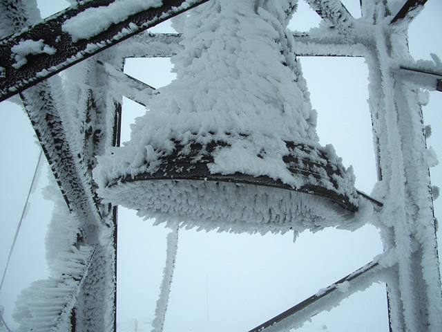 2290 m altitude. The bell at Cherni Vryh peak is all covered with ice and snow.